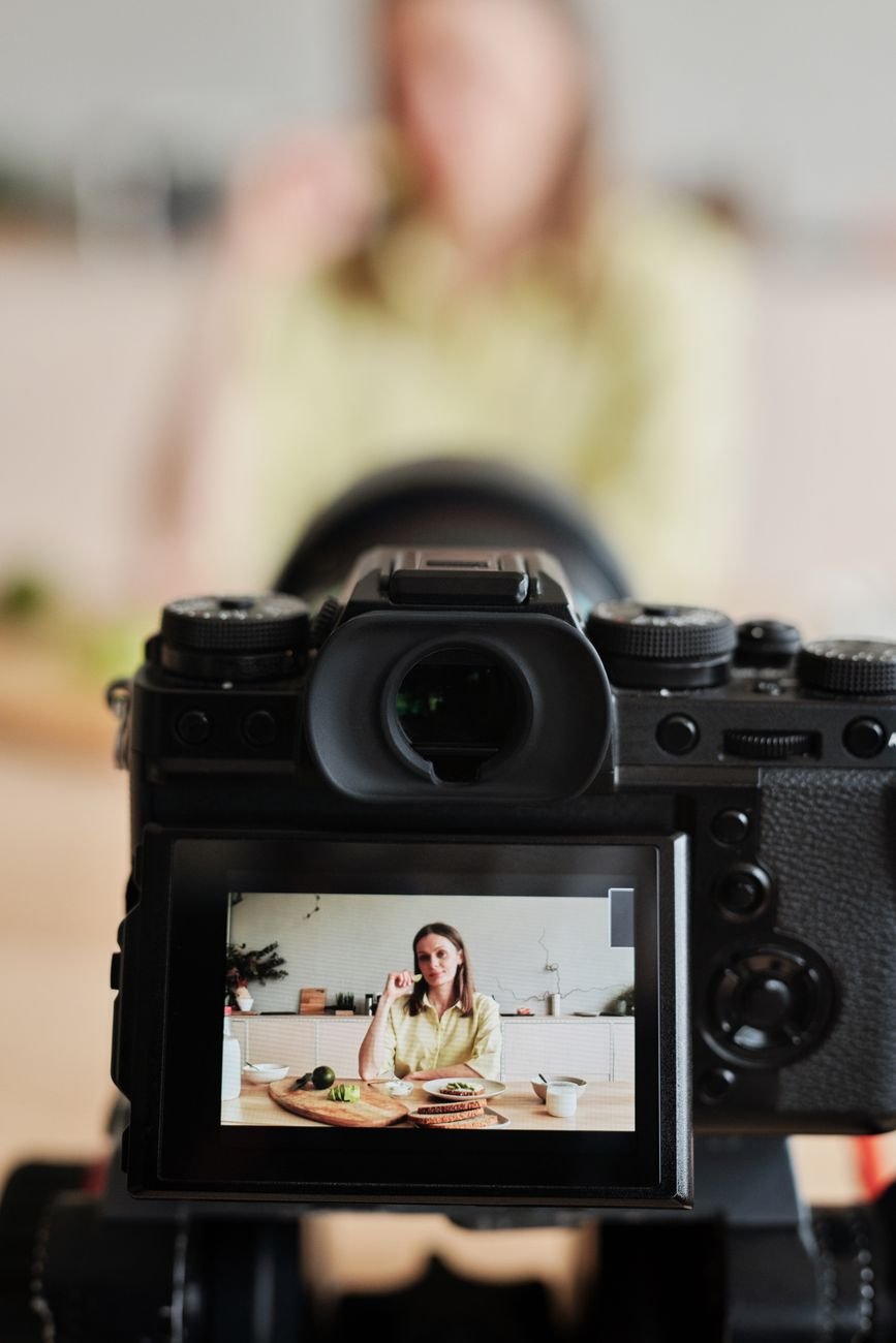 Close-up of a creator filming a product video.